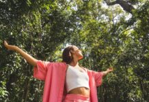 A woman with outstretched arms